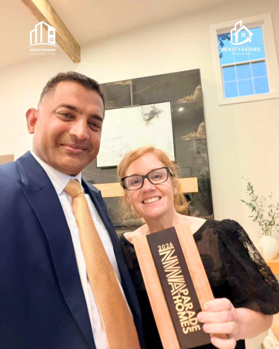 Beauty4Ashes founder with the 2026 NWA Parade of Homes trophy at the awards event