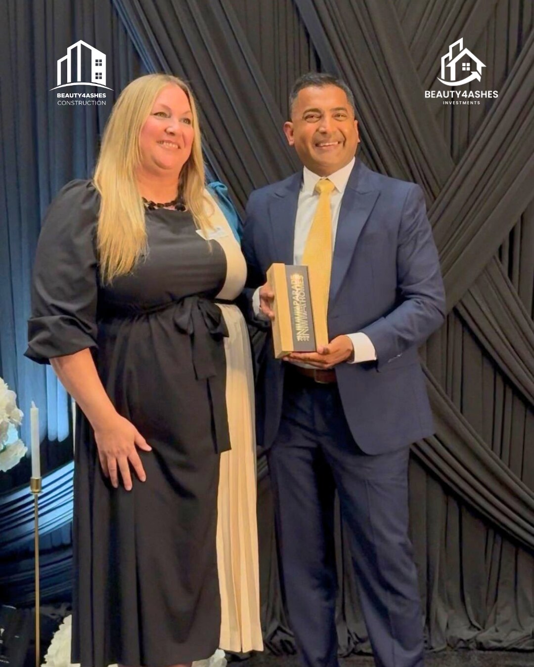 Beauty4Ashes founder accepting the 2026 NWA Parade of Homes award on stage